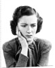 1940s Worried Woman Frowning Holding Hand To Cheek by Anonymous