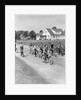 1950s 8 Kids Boys and Girls Ride Bicycles On Country Rural Road Lane Fun House In Background by Anonymous