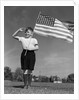 1940s Boy Holding American Flag Saluting Wearing Short Pants by Anonymous