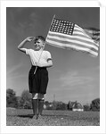 1940s Boy Holding American Flag Saluting Wearing Short Pants by Anonymous