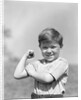 1930s Boy Making Strong Muscle Flexing Arm by Anonymous