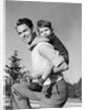 1940s Father Carrying Son Piggyback On Back by Anonymous