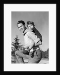 1940s Father Carrying Son Piggyback On Back by Anonymous