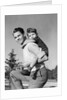 1940s Father Carrying Son Piggyback On Back by Anonymous