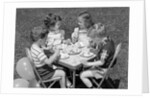 1950s Boys and Girls At Table Eating Cookies and Ice Cream For Birthday Party by Anonymous