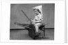 1930s Boy Playing Wooden Sword Paper Hat Riding Chair Like A Horse by Anonymous