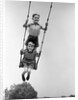 1930s Two Boys Sitting Standing On Playground Swing by Anonymous