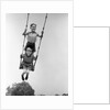 1930s Two Boys Sitting Standing On Playground Swing by Anonymous