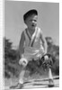 1930s Boy Wearing Baseball Hat and Glove Bent Over With Hands On Knees Yelling by Anonymous