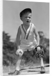 1930s Boy Wearing Baseball Hat and Glove Bent Over With Hands On Knees Yelling by Anonymous