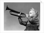 1940s Boy Blowing Bugle Outdoor by Anonymous