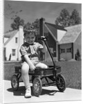 1940s Boy Sitting In Wagon by Anonymous