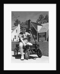 1940s Boy Sitting In Wagon by Anonymous