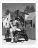 1940s Boy Sitting In Wagon by Anonymous
