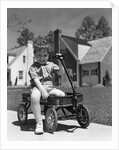 1940s Boy Sitting In Wagon by Anonymous