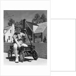 1940s Boy Sitting In Wagon by Anonymous