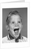 1960s Portrait Excited Boy With Mouth Wide Open Laughing by Anonymous