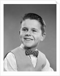 1950s Boy Portrait Wearing Checked Vest Polka Dot Bow Tie School Picture by Anonymous