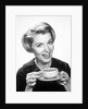 1960s Woman Drinking Coffee Holding Cup And Saucer by Anonymous