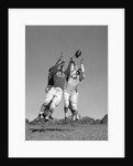 1960s Three Football Players Reaching To Catch Ball by Anonymous
