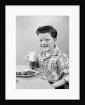 1930s 1940s Freckle-Faced Boy Sitting Dinner Table Holding Glass Milk by Anonymous