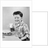 1930s 1940s Freckle-Faced Boy Sitting Dinner Table Holding Glass Milk by Anonymous