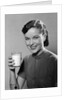 1950s Portrait Woman Holding A Glass Of Milk Studio by Anonymous