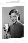 1950s Portrait Woman Holding A Glass Of Milk Studio by Anonymous