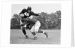 1940s Football Player Being Tackled by Anonymous
