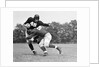 1940s Football Player Being Tackled by Anonymous