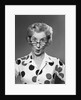 1950s 1960s Portrait Woman Polka Dot Dress Looking Over Eyeglasses by Anonymous