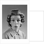 1960s Portrait Woman With Hair In Rollers Eyes Wide With Suprise by Anonymous