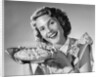 1950s Woman Presenting Holding Freshly Baked Pie by Anonymous