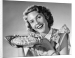 1950s Woman Presenting Holding Freshly Baked Pie by Anonymous