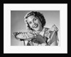 1950s Woman Presenting Holding Freshly Baked Pie by Anonymous