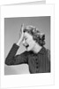 1950s Woman Hitting Forehead With Heel Of Hand by Anonymous