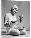1930s Woman In Silk Teddy Lingerie Opening A Box Of Hosiery by Anonymous