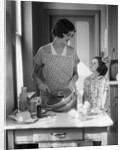 1920s 1930s Mother With Mixing Bowl In Kitchen With Daughter by Anonymous