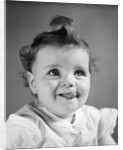 1940s Baby Girl Sticking Out Her Tongue by Anonymous