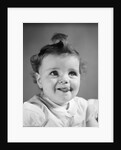 1940s Baby Girl Sticking Out Her Tongue by Anonymous