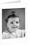 1940s Baby Girl Sticking Out Her Tongue by Anonymous