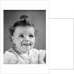 1940s Baby Girl Sticking Out Her Tongue by Anonymous