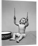 1940s Baby In Diaper With Drum Holding Up Drumsticks by Anonymous