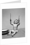 1940s Baby In Diaper With Drum Holding Up Drumsticks by Anonymous