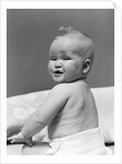 1940s Baby In Diaper Looking Back Over Shoulder With Funny Facial Expression by Anonymous