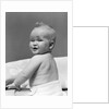 1940s Baby In Diaper Looking Back Over Shoulder With Funny Facial Expression by Anonymous