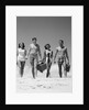 1960s Teenage Couples Wearing Bathing Suits On Beach Carrying Picnic Baskets by Anonymous