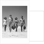 1960s Teenage Couples Wearing Bathing Suits On Beach Carrying Picnic Baskets by Anonymous