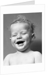1940s Portrait Baby With Messy Hair Laughing With Eyes Closed by Anonymous
