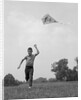 1960s Boy Running Flying Kite by Anonymous